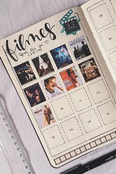 an open planner with movies on it sitting next to a pencil and ruler in front of the calendar