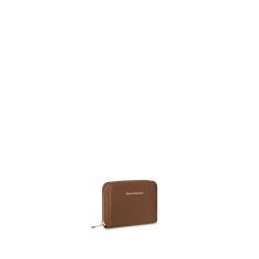 Experience elegance with this light brown wallet, adorned with luxurious gold hardware. Crafted from premium leather, it combines practical storage with a timeless color, perfect for the modern, empowered woman. Silk Scarf Hair, Gold Wallet, Brown Wallet, Practical Storage, Backpack Travel Bag, Small Leather Goods, Travel Backpack, Long Wallet, Silver Hardware