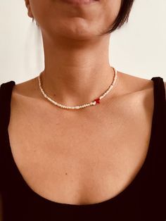 - - - DETAILS - - - Pearl Size: 3-4 mm 100% Natural Fresh Water Pearls Chain Length:  36+5cm extender chain Material: 18 K Gold Plated It is designed with the perfect combination of 3mm real freshwater pearls and red bar coral. *It is designed using undrawn natural pearls. *Pearls are a gem of introspection that encourages us to truly discover our true selves and our true purpose in the world. *Since coral stone comes to life from a skeleton, it symbolizes immortality, wisdom and happiness. It i Gold Plated Pearl Necklace, Beaded Strand Jewelry As A Gift, White Beaded Heart-shaped Pearl Necklace, Elegant Strand Beaded Necklaces As A Gift, Adjustable Strand Pearl Necklace Gift, Beaded Chain Strand Beads Gift, Pearl Strand Beaded Necklace Gift, Adjustable Pearl Necklace With Heart And Round Beads, Pearl Beaded Strand Necklace For Gift