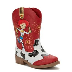 a child's cowboy boot with a red and white cowgirl on the side