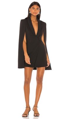 Find KATIE MAY Boss Lady Mini Cape Dress on Editorialist. Katie May Boss Lady Mini Cape Dress in Black. - size S (also in XS) Katie May Boss Lady Mini Cape Dress in Black. - size S (also in XS) Self: 97% poly 3% spandex Lining: 100% poly. Dry clean only. Fully lined. Padded shoulders. Open sleeves. Exposed front button closure with keyhole accent. Made in USA. KATR-WD83. GWAC0200. After receiving international praise for designing her younger sister's wedding gown, Katie May Neu launched her own What Is Cocktail Attire, Cocktail Attire For Women, Lady Clothes, Best Blazer, Katie May, Open Sleeves, Cocktail Attire, Cape Dress, Menswear Inspired