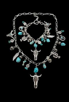 Southwestern Western Silver Tone Faux Turquoise Charm Bracelet Necklace Set Necklace measures approximately 19.5" with 2" extender to finish at 21.5" The center charm including drop measures approximately 2" X 1"   Bracelet measures approximately 8" Total weight is approximately 57 Grams Condition: New  Metal: Silver Tone Comes in a gift box! Items that are pre-owned will exhibit the expected surface scratches and dings to the silver from normal wear. Take a look at our other earrings  https://w Western Earring, Turquoise Charm, New Metal, Set Necklace, Necklace Charm, Bracelet Necklace, Business Ideas, Necklace Set, Necklaces Bracelets