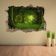 an open hole in the wall shows a green forest with trees and grass on it