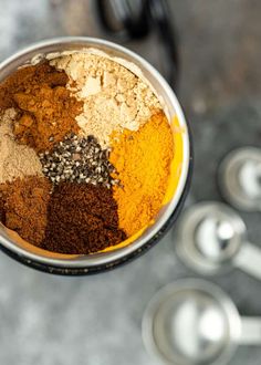 a bowl filled with different types of spices