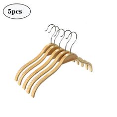 five wooden clothes hangers with clips attached to the top and bottom of each one