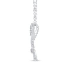 Symbolize your forever love with the elegant look of this diamond infinity pendant in sterling silver. Created in sterling silver. The infinity symbol shimmers with diamonds along half the design. Inside, a scrolled ribbon holds a diamond in each end. Radiant with 1/4 ct. t.w. of diamonds This pendant suspends along an 18.0-inch cable chain that secures with a lobster claw clasp. Modern White Jewelry With Diamond Accents, Infinity White Gold Diamond Jewelry, White Diamond Jewelry With A Modern Twist, White Jewelry With Diamond Accents And Modern Twist, Modern White Diamond Jewelry, Sterling Silver Diamond Necklace With Elegant Design For Anniversary, Silver Infinity Jewelry With Brilliant Cut, Silver Jewelry With Brilliant Cut In A Modern Twist, Modern Twist Silver Jewelry With Prong Setting