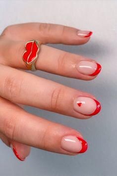 These gorgeous red French tip nails are a CLASSIC. Whether you want minimal red French or long extra french manicure, we've got something here for you French Tip Nails With Heart, Long Red