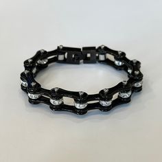 Black Bike Chain Bracelet With Clear Stones. No Flaws Or Signs Of Wear. Measurements Are Shown In Photos. Metal Is Stainless Steel. Black Chain Link Jewelry For Everyday, Everyday Black Chain Link Jewelry, Trendy Black Chain Link Jewelry, Black Edgy Bracelets As Gift, Black Chain Link Bracelet Gift, Black Metal Chain Bracelet As A Gift, Black Metal Chain Bracelet For Gift, Gift Black Metal Chain Bracelet, Trendy Black Chain Bracelet