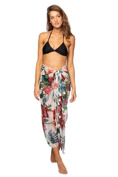 A sarong for every occasion! This is the perfect transitional piece from day time pool parties to a walk along the pier. Throw this over your bathing suit with this versatile piece that has at least 5 ways to wear. Pool to Party 100% Sheer Poly | Digital Print One-Size fits most Made in USA of imported fabrics All Sales Final Floral Print Swimwear For Beach Party During Resort Season, White Floral Print Swimwear For Beach Cover-up, Tropical Swimwear For Beach Party During Resort Season, Tropical Vacation Sarong With Tie-side, Tropical Tie-side Sarong For Vacation, Tropical Tie-side Sarong For Pool, Bohemian Sarong For Swimming Vacation, Bohemian Sarong For Swimming And Vacation, Bohemian Sarong With Tropical Print For Pool