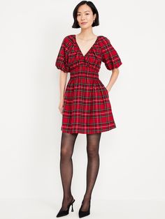 plunging v-neck puff sleeves elastic cuffs tie-strap nape smocked waist mini length tartan print relaxed fit with a defined waist hits at thigh models are approx.  5'9" and wear sizes s (4), l (12), and xl (18)machine wash according to the care instruction label 90s Holiday Outfit, Christmas Red Dress, Christmas Dress Outfit, Summer Mini Dresses, Plaid Christmas Dress, Laundry List, Mini Dress Red, Red Christmas Dress, Red Plaid Dress