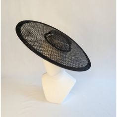 One cartwheel woven sinamay straw hat base in slate black that measures approximately 17.25" (43.8cm) in diameter. Crown is 1.25" (3cm) high and the crown width is approx. 6" (15.24cm). The edges of the brim are finished in wired sinamay. The multi-layer stiffened sinamay straw has a great sturdy weave and provides excellent support for your millinery creations. This is NOT a ready to wear finished hat and will not stay on your head unless you add a head band or elastic to wear. This base does have a small sleeve sewn into the crown that will accomodate headbands listed separately in my shop. Add embellishments of your choice. A nice high quality base - I know you'll be pleased! This hat base is listed separately in lots of different colors. Check my listings for those... Lots of hat bases Diy Millinery, Hat Form, Blank Hats, Millinery Supplies, Sinamay Hats, Hat Base, Mae West, Vintage Millinery, Not Ready