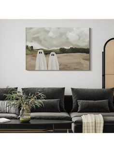 a living room scene with two ghost figures on the wall and a plant in the foreground