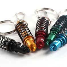 coilover-keychains-in-black_-yellow_-red_-green-and-blue_-jdm-keychains_-car-guy-gifts.jpg Key Organization, Best Backpacks For School, Jdm Racing, Racing Harness, Red Race, Car Lover Gifts, Blue Yellow Red, Green Bottom, Key Organizer