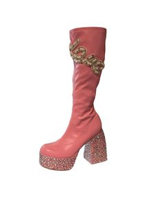 Bedazzled pink knee-high boots by Asta Razma. Custom patch work. Jeweled platform and heel. Inner side zipper closure. Size: 7 Trendy Pink Platform Party Boots, Pink Knee-high Platform Boots For Party, Pink Platform Boots For Party In Fall, Pink Fall Party Platform Boots, Pink High Heel Mid-calf Boots For Party, Pink Platform Heeled Boots For Party, Trendy Pink Mid-calf Boots For Party, Trendy Pink Mid-calf Party Boots, Pink Leather Knee-high Boots