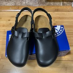 Basically Brand New Black Leather Clog Birkenstocks On Worn Twice For A Company Event For The Brand. Willing To Negotiate Price A Little. Message Me For Any Questions. Classic Black Clogs With Cushioned Footbed, Black Clogs With Leather Sole And Flat Heel, Black Clogs With Buckle Closure And Flat Heel, Black Leather Clogs With Removable Insole, Black Clogs With Cushioned Footbed And Flat Heel, Classic Black Clogs With Flat Heel, Classic Black Flat Heel Clogs, Black Leather Clogs With Flat Heel, Black Leather Footbed Clogs With Round Toe