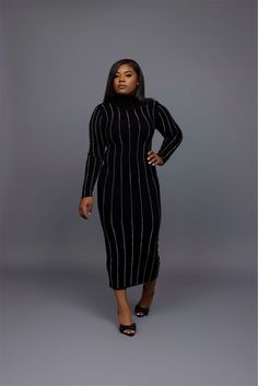 Step out in style with this sleek black turtleneck midi dress, designed for the woman who loves a chic, understated look with a hint of edge. Featuring shimmering rhinestone pinstripes that elongate the figure, this dress offers a sophisticated silhouette that hugs your curves in all the right places. The turtleneck design adds a polished touch, while the fitted long sleeves keep the look elegant and versatile. Perfect for both formal and semi-casual occasions, this dress is easy to style with h Fitted Turtleneck Midi Dress For Party, Winter Evening Turtleneck Midi Dress, Stretch Turtleneck Midi Dress For Party, Chic Turtleneck Midi Dress For Party, Elegant Spring Turtleneck Midi Dress, Glamorous Knee-length Winter Midi Dress, Spring Evening Turtleneck Midi Dress, Winter High Neck Midi Dress For Date Night, Black Fitted Turtleneck Midi Dress