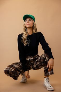 These pants feature a classic plaid pattern with a high-rise waist for a flattering fit. The four-pocket design adds functionality to fashion, and the fleece exterior ensures warmth and coziness. Elevate your winter wardrobe with these versatile and chic plaid pants. zip-fly with button closure function pockets unlined // paired with the Beverly balloon sleeve sweater in black + the vintage goods foam trucker hat *FINAL SALE* Casual Plaid Pants For Fall, Trendy Plaid Winter Bottoms, Trendy Plaid Bottoms For Winter, Casual Plaid Bottoms For Fall, Plaid Straight Leg Pants For Fall, Plaid Wide Leg Bottoms For Fall, Plaid High-waisted Pants For Fall, High Waist Plaid Pants For Fall, High-waisted Plaid Pants For Fall