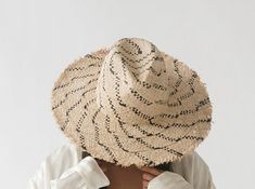 The Gemma is a woven palm straw fedora hat you can dress up for a refined Summer look, with a fringed edge for a bohemian vibe. Chic Handwoven Toquilla Straw Panama Hat, Handwoven Wide Brim Panama Hat, Handwoven Fedora Straw Hat In Paper Straw, Artisan Natural Fedora For Beach, Handwoven Artisan Hat For Spring, Handwoven Paper Straw Fedora Hat, Artisan Handwoven Spring Hat, Eco-friendly Toquilla Straw Hat For Spring, Handwoven Flat Brim Panama Hat For Spring