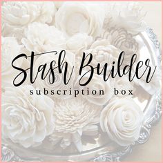 a silver bowl filled with white flowers and the words, stash builder subscription box