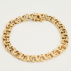 B I S M A R C K ∙ B R A C E L E T  ∙  * Details: Solid Gold ∙ 14K Gold ∙ Yellow Gold * Weight: 25.07 grams * Bracelet length: 7.68 inches // 19.5 cm * Width: 8 mm. * Condition: All our pieces are vintage, antique or close to new. The piece undergoes a restoration proces, which includes ultrasonic cleaning and mild polish techniques to enhance the condition of the piece. * All our pieces are vintage and handpicked. We put a lot of effort into finding the most unique and beautiful items for you gu Heirloom Yellow Gold Jubilee Bracelet, Formal 14k Gold Bracelet, Oval 14k Yellow Gold Bracelet, Heirloom Gold Bracelet With Polished Finish, Heirloom 14k Gold Round Bracelets, Heirloom 14k Gold Bracelets, Heirloom 14k Yellow Gold Bracelets, Heirloom 14k Yellow Gold Bracelet, Heirloom Yellow Gold Oval Link Bracelets