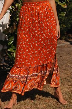 Multicolor Floral Print Maxi Skirt Summer Orange Maxi Skirt With Elastic Waistband, Orange Floral Print Skirt For Day Out, Casual Orange Mini Skirt, Orange Tiered Skirt For Day Out, Red Relaxed Maxi Skirt For Vacation, Orange Maxi Skirt For Summer Vacation, Red Relaxed Fit Maxi Skirt For Vacation, Relaxed Red Maxi Skirt For Vacation, Chic Orange Floral Print Skirt