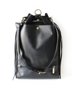 Stylish Black Leather Backpack purses for women. Perfect for carrying a laptop, work, school or travel. Your new ultimate everyday designer backpack purse. Leather Bucket Backpack For Daily Use, Leather Bucket Backpack For Everyday Use, Leather Backpack For Errands, Leather Backpack With Removable Pouch For Errands, Leather Hobo Bag Standard Backpack For Travel, Leather Crossbody Bucket Bag For School, Leather Bucket Shoulder Bag For School, Leather Bucket Backpack, Leather Hobo Bag With Adjustable Strap For School