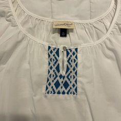 Brand New White Peasant Top From Universal Thread. This Top Has A Cute Cross Stitch Pattern. Size Xxl, New With Tags. White Relaxed Fit Peasant Top For Beach, White Relaxed Fit Peasant Top For Vacation, Casual White Peasant Top With Relaxed Fit, Casual White Peasant Top For Vacation, Cotton Peasant Top With V-neck, White Tie Front Top, White Embroidered Folk Peasant Top, Peasant-style Embroidered Cotton Top For Beach, Traditional Embroidered V-neck Peasant Top