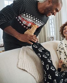 Adult unisex Long John pajama top in legendary soft organic cotton rib knit, complete with cheerful holiday print fit for every festive moment. • Hypoallergenic & eczema-friendly • Sensory-friendly scratch-free seams that lay flat on the skin • Like new wash after wash • OEKO-TEX® STANDARD 100 certified safe from hundreds of harsh chemicals 100% organic combed cotton rib knit Super-smooth flatlock seams Soft ribbed neck and cuffs Tops and pants offered separately for the very best fit OEKO-TEX® STANDARD 100 | 03.U.9375 HOHENSTEIN HTTI | Tested for Harmful Substances | www.oeko-tex.com/standard106 GOTS Certified by OTCO Prewashed Imported. Pajamas, Shop By Department, Men & Adult Unisex. | Adult Holiday Long John Pajama Top - Size XS - Black Fairisle - Hanna Andersson Casual Winter Sleepwear For Holidays, Casual Winter Holiday Sleepwear, Winter Crew Neck Sleepwear With Relaxed Fit, Winter Crew Neck Relaxed Fit Sleepwear, Casual Cotton Holiday Sleepwear, Playful Cotton Sleepwear For Winter, Festive Winter Cotton Sleepwear, Long Johns Pajamas, Unisex Pajamas