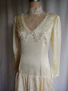 "Beautiful Victorian wedding dress with a dropped waist Silky smooth fabric Lace high collar Back zipper Label - Gunne Sax Size 11 Bust - 36\" Waist - 30\" Hips - 40\" Back - 14\" Sleeve - 21\" Length - 48\" Excellent vintage condition Gently washed and steamed" Fitted Wedding Dress With Lace Collar, Vintage Wedding Gown With Bias Cut, Cream Fitted Wedding Dress With Lace Trim, Fitted Cream Bias Cut Gown, Fitted Bias Cut Wedding Dress, Victorian Wedding Dress, Wedding Dress Lace, Victorian Wedding, Beautiful Suit