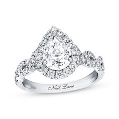 a pear shaped diamond engagement ring with the words, not love written on it's side