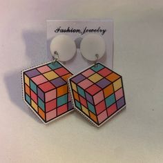 Rubix Cube Earrings Nwt Modern White Clip-on Earrings, Trendy White Drop Clip-on Earrings, Retro White Dangle Earrings, Retro White Drop Earrings, Retro White Dangle Jewelry, Retro White Earrings For Gift, Retro White Clip-on Earrings As Gift, White Retro Clip-on Earrings As Gift, Modern White Clip-on Earrings For Gift