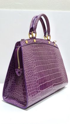 Luxury Crocodile Pattern Top Handle Satchel, Luxury Crocodile Pattern Handheld Bag, Luxury Crocodile Pattern Shoulder Bag, Luxury Purple Rectangular Bag, Luxury Rectangular Satchel With Crocodile Pattern, Luxury Handheld Shoulder Bag With Crocodile Pattern, Luxury Crocodile Pattern Shoulder Bag For Shopping, Luxury Crocodile Pattern Tote Satchel, Luxury Satchel With Crocodile Pattern Tote