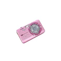 a pink digital camera sitting on top of a white surface