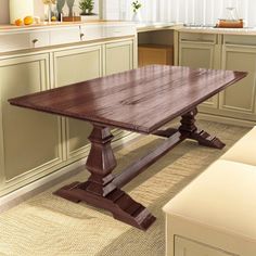 a wooden table sitting in the middle of a kitchen