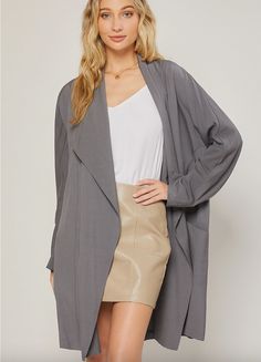 Woven duster features a draped collar, dolman long sleeves, side pockets, and an effortless oversized fit. Super chic duster coat. Transform your simple look by adding this duster! Chic Gray Spring Cardigan, Chic Wrap Outerwear For Day Out, Chic Open Front Outerwear For Daywear, Chic Wrap Outerwear For Daywear, Emily In Paris Style, Zara Trench Coat, Draped Collar, Floral Coat, Burgundy Jacket