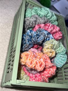 there are many crocheted items in the basket