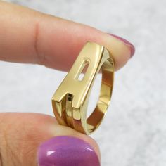 This pretty custom initial ring displays your choice of initial letter in a block font, simply choose the initial you want and we will make it to a meaningful gift to a unique person that shows how much he means to you. This statement-making name ring is eye-catching and perfect for any special occasion or for everyday wear, be sure that you will enjoy your letter A ring. #jonjonjewel #Initial Ring #LetterRing #AlphabetRing #MonogramRing #NameRing Initial Ring Gold, Gold Name Ring, Alphabet Ring, Monogram Ring Gold, Turquoise Wedding Rings, Unique Person, Gold Initial Ring, Block Font, Name Ring