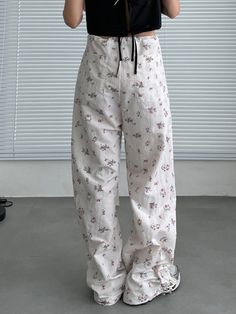 Harajuku Kawaii Aesthetic Y2K Floral White Baggy Cargo Trousers Parachute Pants Size Chart *Standard shipping time to the US is 9-19 business days. Please consult our shipping page for shipping time estimates for other countries. *Please check the measurements/size chart very carefully when ordering from The Kawaii Factory. Most of our clothes come in Asian sizes, which are generally 1-2 sizes smaller than US/EU sizes. Buyers shall bear the full cost of return shipping charges unless the product is significantly different from what is described on the product page. *Lingerie and pajamas cannot be returned or exchanged. White Harajuku Bottoms For Spring, White Harajuku Style Bottoms For Spring, Y2k Style Cotton Pants For Spring, Y2k White Pants With Pockets, White Y2k Pants With Pockets, Harajuku Cotton Bottoms With Pockets, Harajuku Style Cotton Bottoms With Pockets, White Harajuku Streetwear Bottoms, Harajuku Style White Streetwear Bottoms