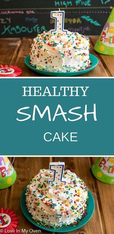 healthy smash cake with white frosting and sprinkles on green plates in front of chalkboard background