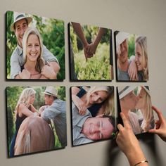 a person holding up four pictures on the wall with their hands in front of them