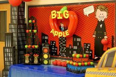 an apple themed birthday party with balloons and decorations