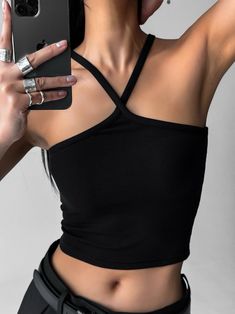 A slimfit tank top with cross over straps at the neckline. Slight spandex stretch. Model is in MINUSEY ONE SIZE. ✔️ Free worldwide express shipping over $100✔️ Loved by 6,500+ customers✔️ Limited edition collections, maximum styleStay ahead of the trend with can’t-find-anywhere-else staples. Your closet will thank you 💕* MINUSEY ONE SIZE = EU 34-36, US 2-6* 63% Polyester / 33% Rayon / 4% Spandex* Dry clean* Made in Korea - Model Height: 172cm/5'7" (US 2, EU 34) Stretch Sleeveless Cross-tied Halter Top, Fitted Crisscross Top With Built-in Bra, Trendy Stretch Bandage Tank Top, Black Crisscross Straps Crop Top, Stretch Crop Top With Cross Back Straps, Stretch Cross-back Crop Top With Straps, Fitted Crop Top With Straps And Cross Back, Fitted Crop Top With Built-in Bra And Crisscross Design, Strappy Stretch Tank Top For Night Out