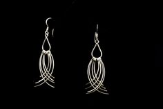 "Curved Sterling Silver Fringed Earrings * 2\" long from top of wire * 1 1/2\" drop length * 1/2\" wide" Elegant Wire Wrapped Drop Hoop Earrings, Elegant Metal Teardrop Earrings With Wire Wrapped Detail, Elegant Metal Teardrop Earrings Wire Wrapped, Elegant Metal Wire Wrapped Teardrop Earrings, Fringed Earrings, Long Silver Earrings, Boys Jewelry, Braided Ring, Long Drop Earrings