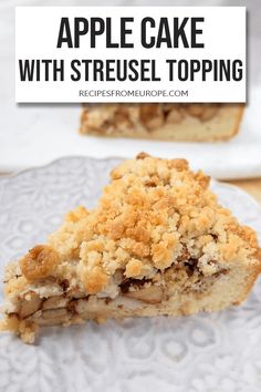 a slice of apple cake with streusel topping on a plate