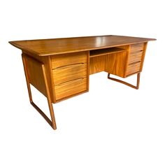 a wooden desk with two drawers on one side and an extension drawer on the other