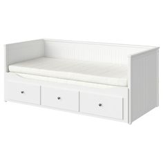 a white daybed with three drawers and a mattress on it's side, in front of a white background