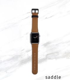 Faux leather Apple Watch band. Minimalist style for your Apple Watch Series 1, 2, 3, 4, 5, 6 or SE.Color options:Saddle BrownBlackGrayStorm BlueBlush PinkPutty*Every monitor displays colors differently. We cannot guarantee an exact match to your screen's color display.*NOTE ON GOLD APPLE WATCHES. Apple's "gold" color is a moving target. The tone changes from year to year. Our Gold buckles and lugs are yellow gold. For the Gold Series 4 Apple Watch, our Rose Gold buckles and lugs look better with Leather Apple Watch Band, Gold Apple Watch, Ultra Series, Apple Watch 42mm, White Liners, Apple Watches, Gold Apple, Apple Watch Bands Leather, Apple Watch 38mm