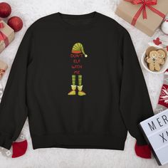 🎅 Get Cozy and Festive with Our Merry Christmas Sweatshirts! 🎄 'Tis the season to be jolly, and we've got just the collection to make your Christmas merrier than ever. Explore our Merry Christmas sweatshirts, where comfort meets holiday cheer in style! 🎅 Merry Christmas Everyone: Festive Christmas Sweatshirts Embrace the spirit of the season with our Merry Christmas sweatshirts. Spread joy, warmth, and goodwill with every wear. ☃️ Winter Wonderland Wardrobe: Christmas Shirts for a Chilly Seas Gift Black Long Sleeve Shirt, Black Long Sleeve Shirt Gift, Festive Winter Crew Neck Shirt, Festive Winter Shirt With Letter Print, Winter Crew Neck Shirt With Letter Print, Crew Neck Shirt For Winter Festive Occasion, Crew Neck Shirt With Letter Print For Winter, Funny Long Sleeve Christmas Tops, Funny Long Sleeve Christmas T-shirt