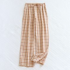 Elevate your loungewear collection with Ever Lasting's Plaid Washed Cotton Pajama Pants. Made from soft, breathable washed cotton, these pants provide both comfort and style for your relaxation time. The classic plaid pattern adds timeless charm, making them perfect for lounging at home or enjoying a cozy night in. Featuring an elastic waistband and relaxed fit, these pajama pants ensure optimal comfort as you unwind after a long day. Treat yourself to the ultimate in comfort and style with our Plaid Washed Cotton Pajama Pants. Features: Relax Fit Premium Quality Stretchy Waistband Breathable (great for all seasons) 100% Cotton Great Gift! Sizes: Small/Medium: Pant Length 38 in (96cm), Waist 42 in (106cm), Hip 25 in (63cm) Medium/Large: Pant Length 39 in (99cm), Waist 44 in (112cm), Hip 26 Cotton Sleepwear For Summer, Cotton Harem Pants With Elastic Waistband For Loungewear, Casual Sleep Pants With Pockets, Cotton Sleepwear With Pockets For Relaxation, Casual Sleep Bottoms For Summer, Casual Summer Sleep Bottoms, Casual Relaxed Fit Sleep Pants, Cotton Wide Leg Sleep Bottoms, Cotton Bottoms With Pockets For Relaxation