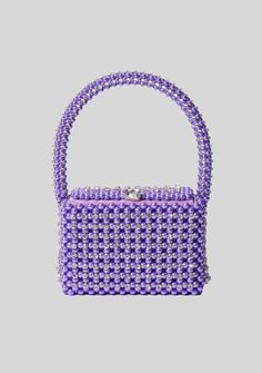 The Eclipse Pearl Bag is a glamorous addition to any ensemble. This top-handle box bag is fully embellished with pearls, making it the ultimate it-girl accessory. Shown here in Purple. HANDMADE Exterior: Faux Pearl, Interior: 100% Polyester Made in India Style No. HB23-6918 Pearl Interior, High End Handbags, Cute Mini Backpacks, Australia Clothes, India Style, Disco Era, Arm Jewelry, Crystal Bags, It Girls